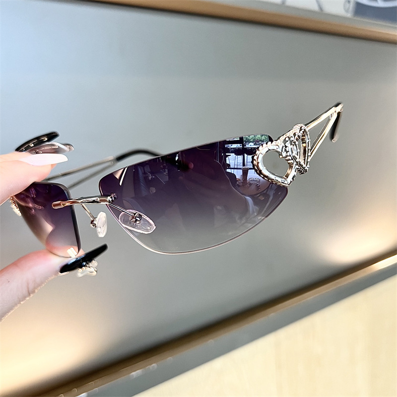 Nieuwe ovale Cat Eye frameloze - Sunglasses Cat Eye recensie en prijs